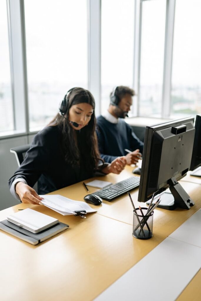 A Woman and Man Working in a Call Center